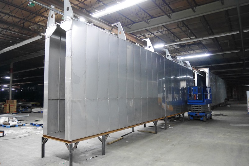 Sistema de pretratamiento de lavado por aspersi&oacute;n